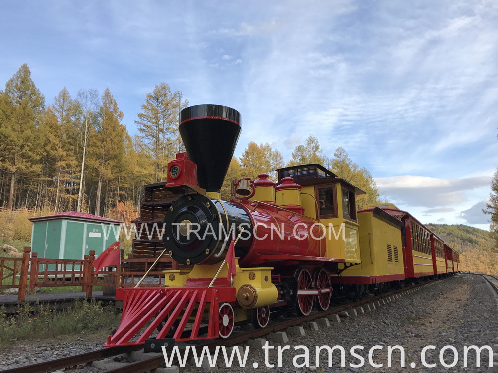 sightseeing train forest train with red and yellow colour at autumn